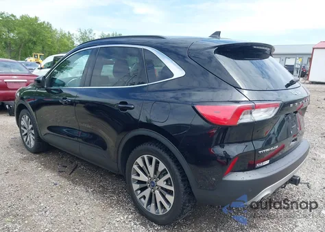 2021 Ford Escape Titanium z USA, uszkodzony, nr VIN 1FMCU9J97MUA77753